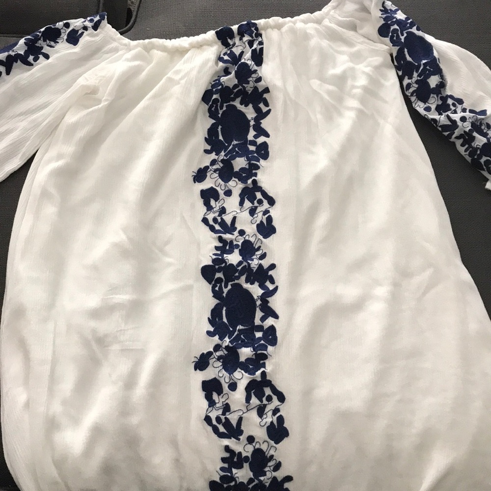 White and blue floral shirt